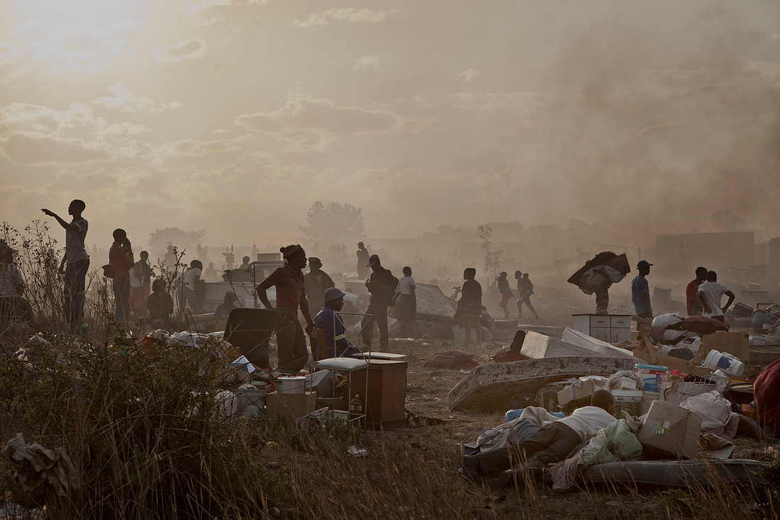 Residents, attempt to retrieve their belongings after fire destroyed homes, Kya Sands. 11.11.15.