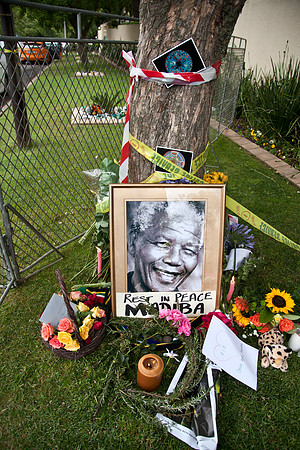Tributes outside Mandela's Houghton home, Johannesburg.